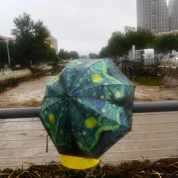 Beijing on alert with two killed as heavy rain batters north China