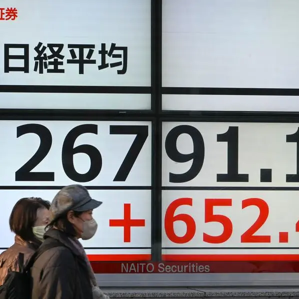 Tokyo shares close lower ahead of key events