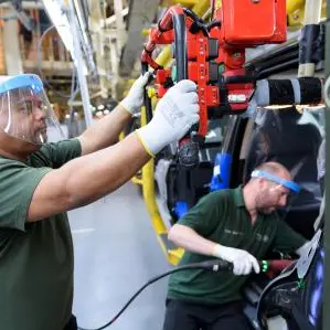 First Range Rover made under social distancing measures comes off Jaguar Land Rover's Solihull production line 