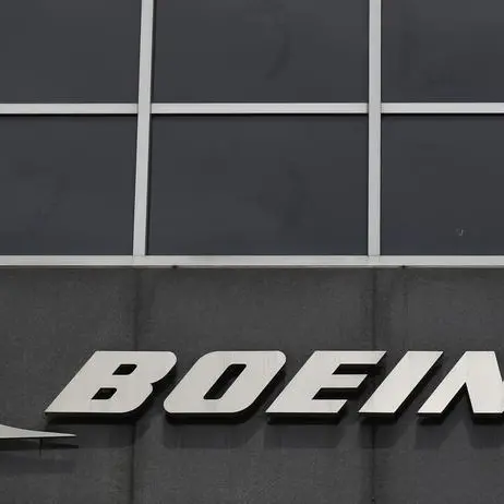 UPDATE 3-Boeing confirms signing jetliner deal with Iran Air