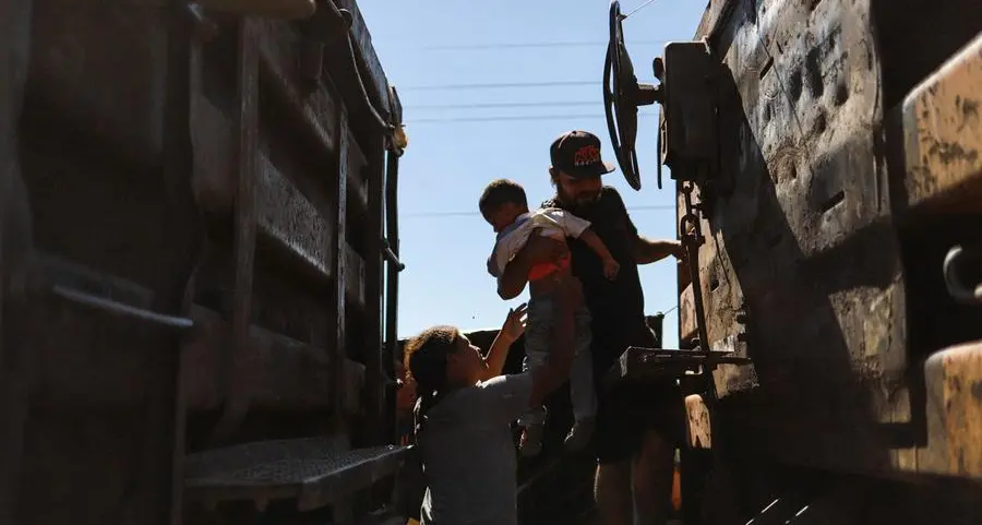 Migrants aboard Mexico cargo trains stranded miles from U.S. border