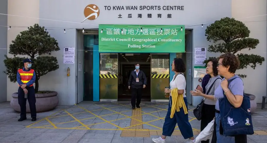 Hong Kong election sees lowest-ever turnout with dissent banned