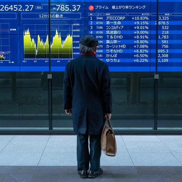 Stock markets fall, yen rallies after BoJ policy move