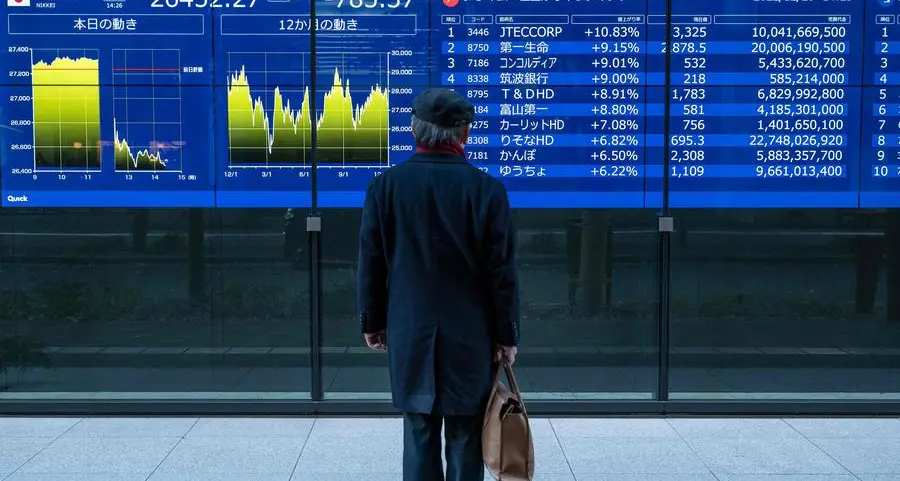 Stock markets fall, yen rallies after BoJ policy move