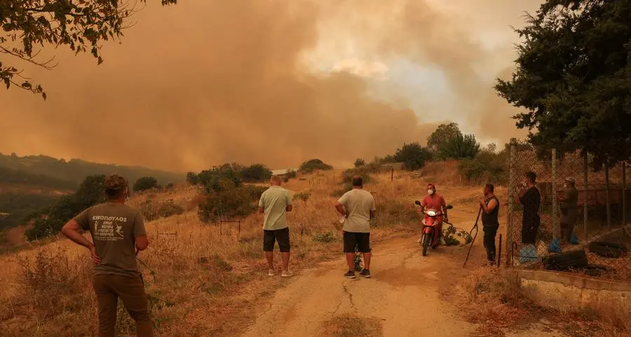 Scorched Europe battles deadly fires, Turkey shuts shipping lane