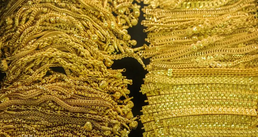 Gold hovers near all-time high on Fed rate-cut bets, US shutdown