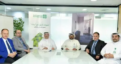 \"KFH\" signs cooperation agreement with \"Hassan Abul Company\"