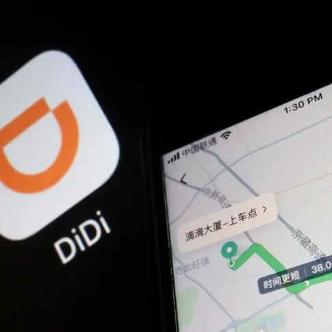 China's Didi reverses course, will remain in Russia