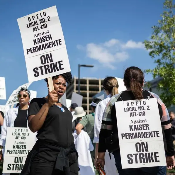 US health care provider, unions reach strike deal