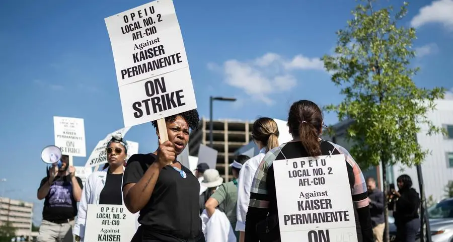 US health care provider, unions reach strike deal