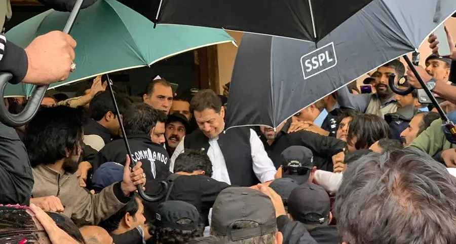 Pakistan ex-PM Khan says arrest bid is plot to bar him from election