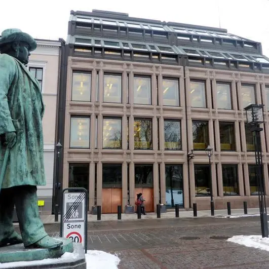 Norway central bank keeps rate on hold in policy reversal