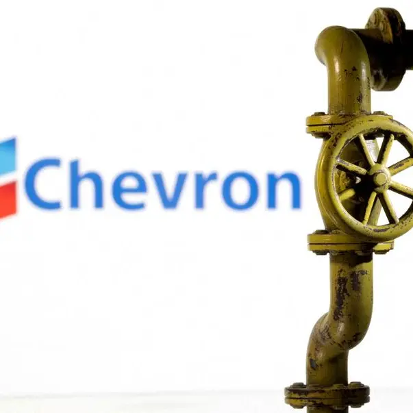 Cash-rich Exxon, Chevron use stock for mega deals amid energy market jitters
