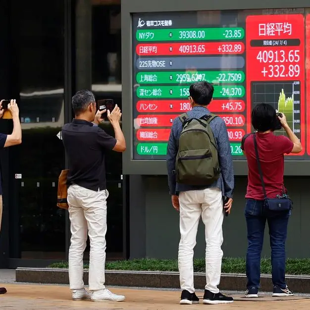 Japan's Nikkei drops from record peak on chip sell-off, yen intervention risks