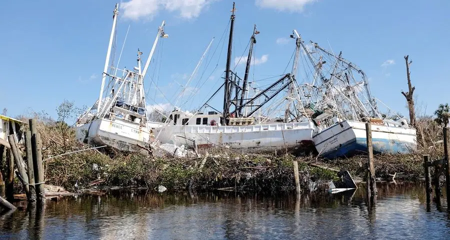 Hurricane-ravaged Florida, Carolinas face daunting recovery