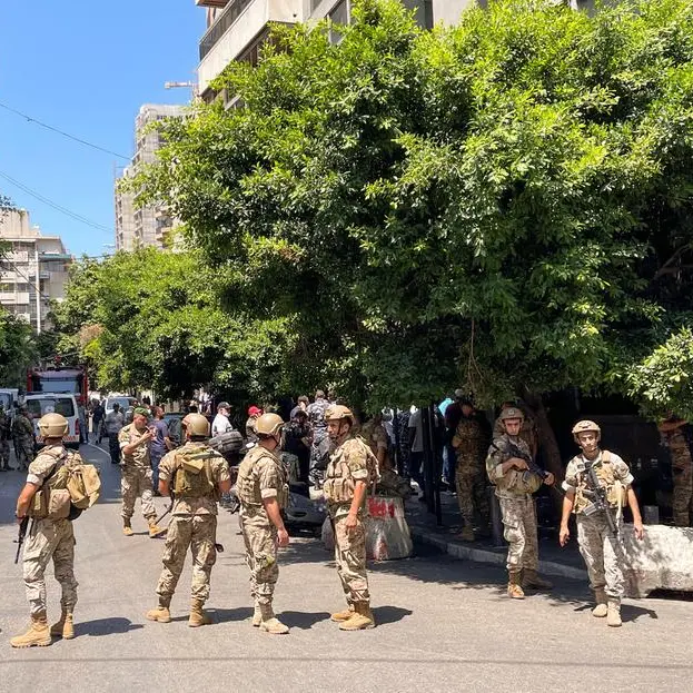 Armed man demanding frozen deposits takes hostages at Lebanese commercial bank