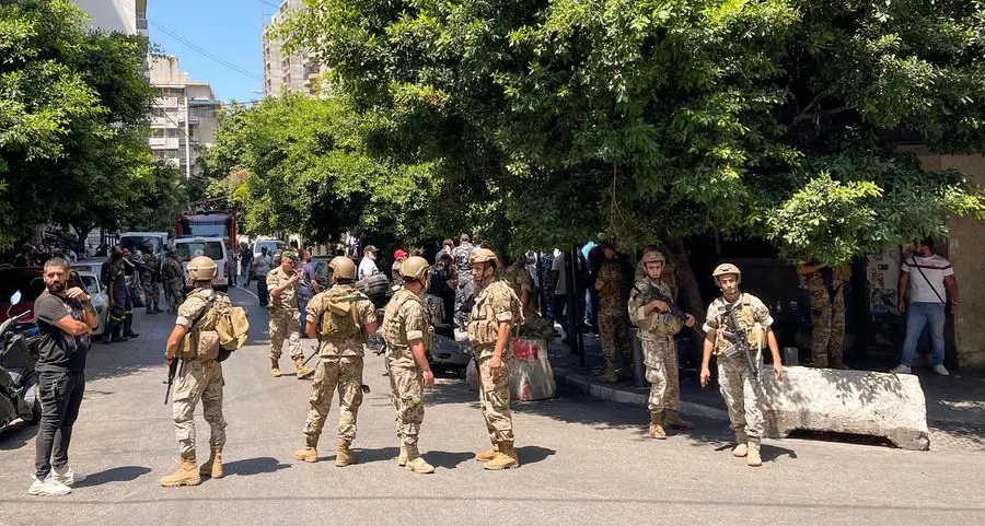 Armed man demanding frozen deposits takes hostages at Lebanese commercial bank