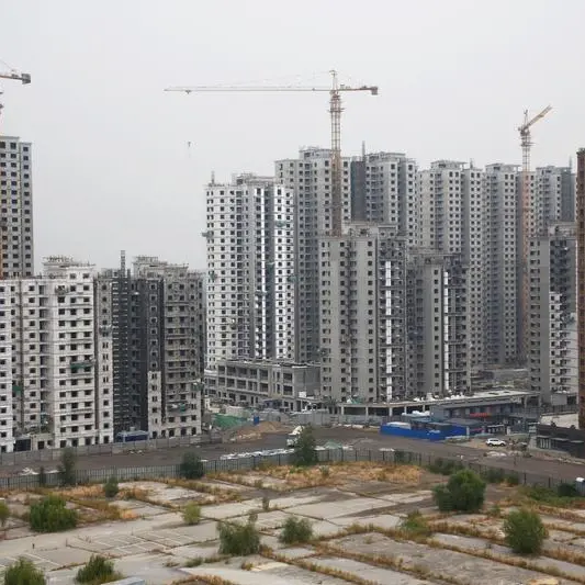 China to let local governments buy homes, cut mortgage rates to revive property sector