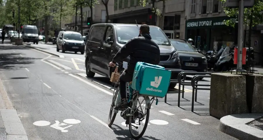 Deliveroo shares surge on 'profit milestone'