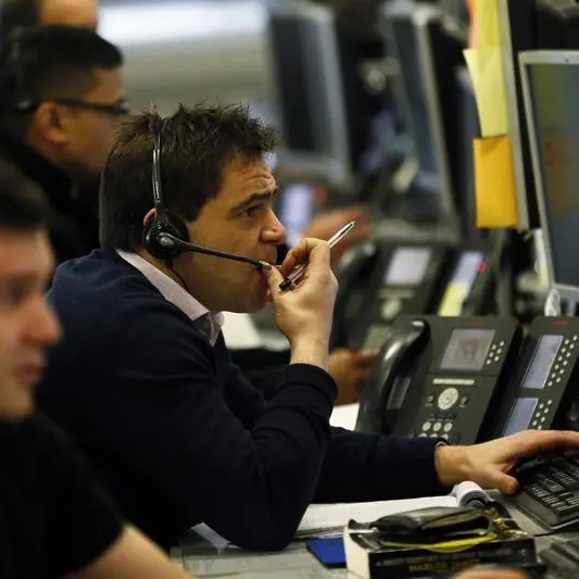 London stocks rise on upbeat global mood, BT Group tumbles