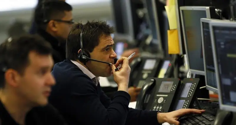 London stocks rise on upbeat global mood, BT Group tumbles