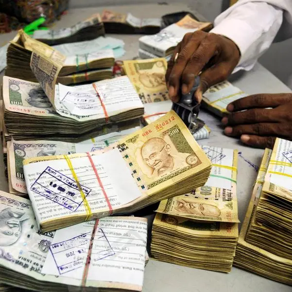 Indian rupee edges lower tracking Asian peers, forward premiums rise