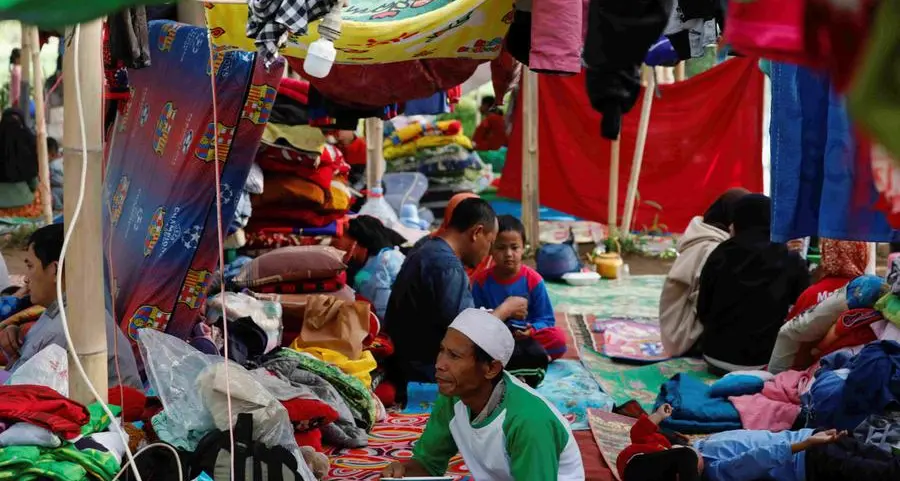 Indonesia struggles to get aid to quake survivors, rescue continues