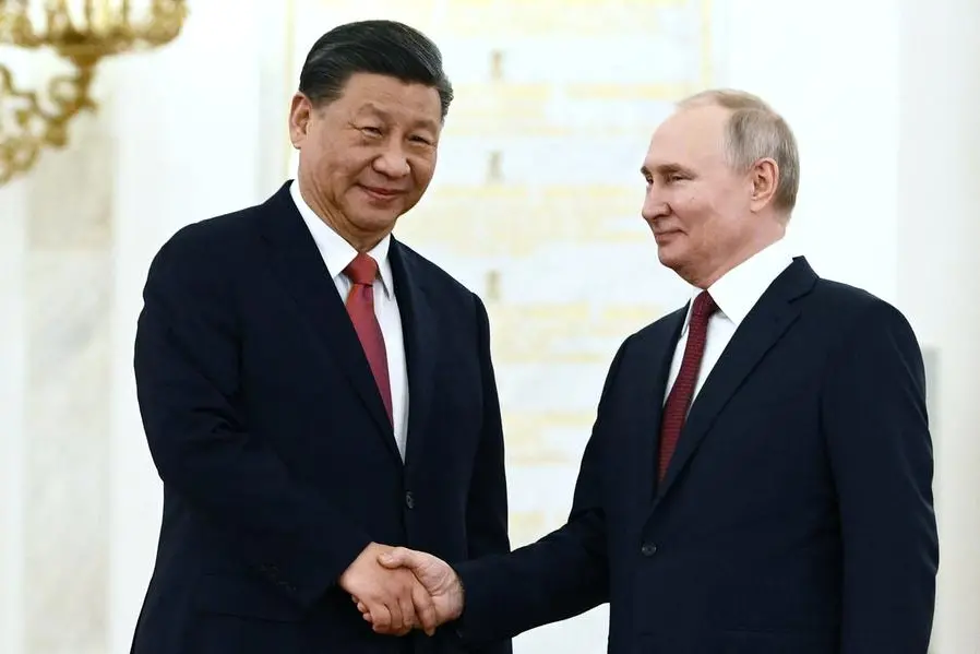 Putin welcomes China's Xi to Moscow