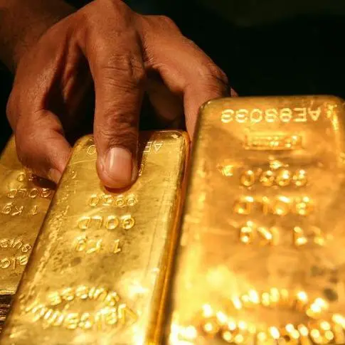 Gold stalls as firmer dollar counter slower rate-hike hopes