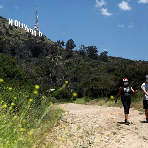 Hollywood’s iconic sign gets big paint job before its 100th anniversary