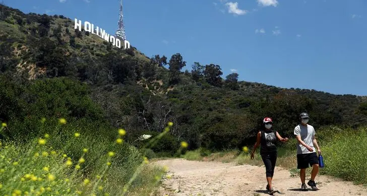 Hollywood’s iconic sign gets big paint job before its 100th anniversary