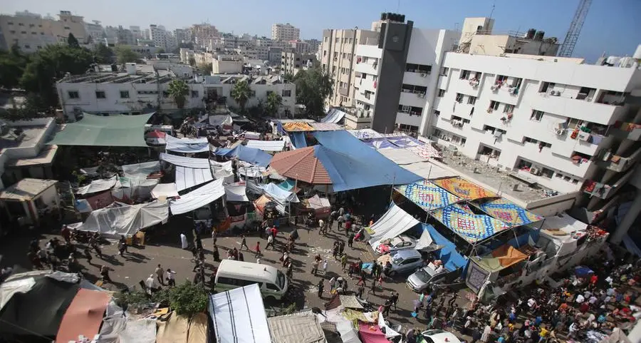 Israeli forces search Gaza hospital as communications cut