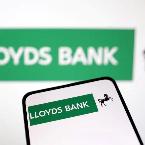 Britain's Lloyds maintains outlook as profit jump meets forecasts