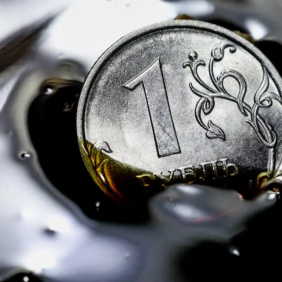 Russian rouble climbs to one-week high vs dollar as tax period begins