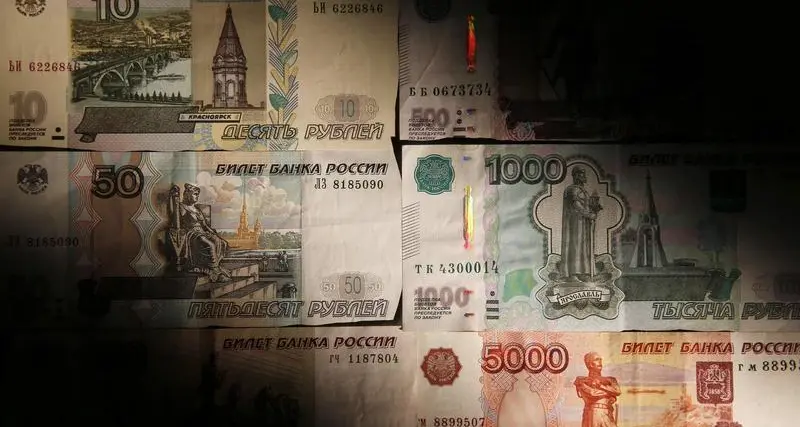 Russian rouble slumps again as volatile year-end trade continues