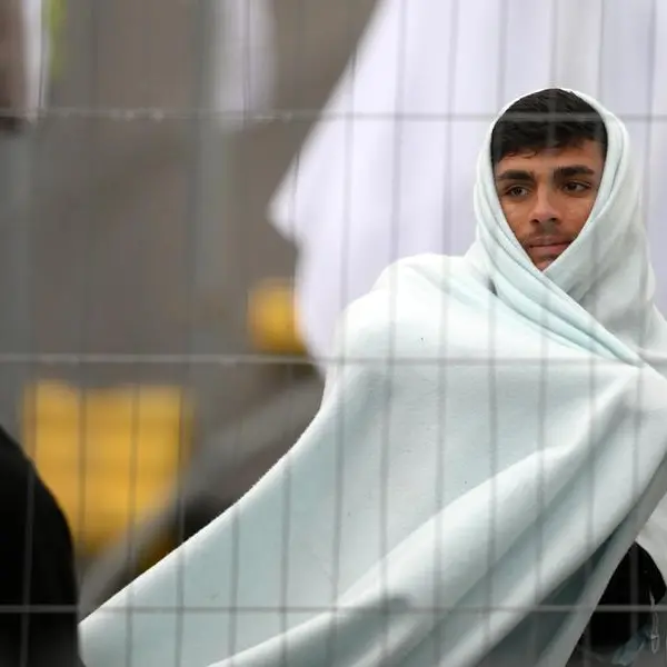 Britain defends treatment of migrants before UN