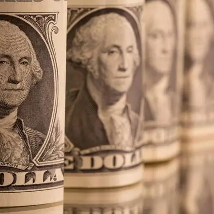 Dollar wavers after Fed minutes offer few surprises