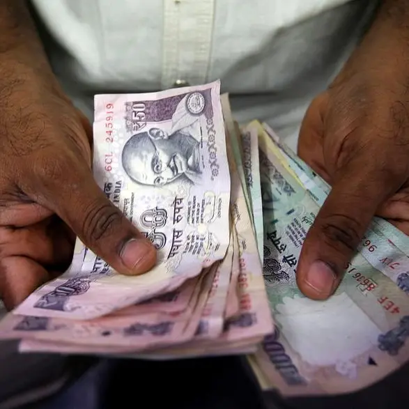 Indian rupee ends flat, wedged between weak Asian peers and exporters' dollar sales