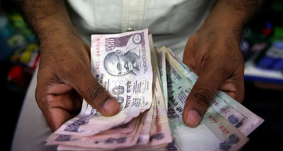 Indian rupee ends flat, wedged between weak Asian peers and exporters' dollar sales