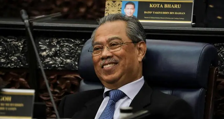 Malaysia's PM wins approval for budget, surviving parliamentary test