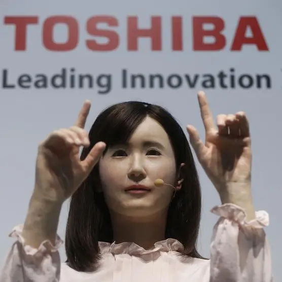 Toshiba shares slide as bigger stake in chip unit likely up for sale