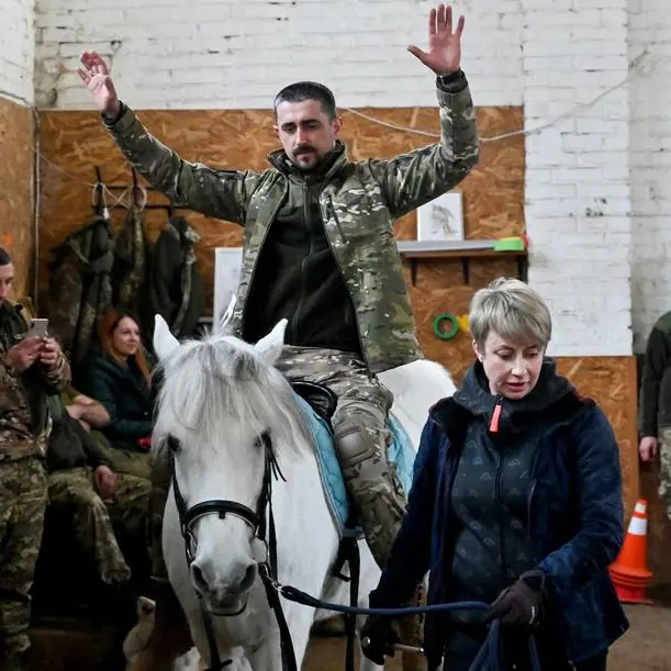 Ukraine soldiers ride out war stress with horse therapy