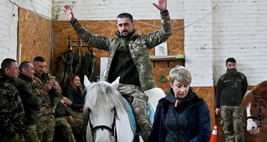 Ukraine soldiers ride out war stress with horse therapy