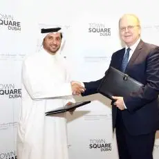 Construction of Town Square residential communities commences; awards deep services contract to Binladin Contracting Group