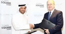 Construction of Town Square residential communities commences; awards deep services contract to Binladin Contracting Group
