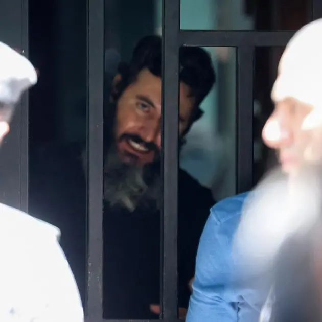 Lebanese man who held up bank to access savings released without charge - brother