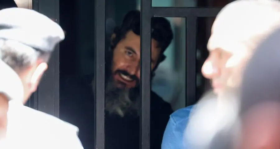 Lebanese man who held up bank to access savings released without charge - brother