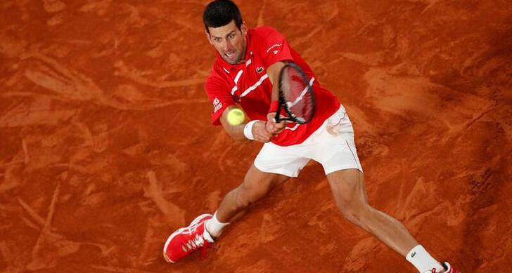 Djokovic practises for Australian Open as he waits for visa ruling