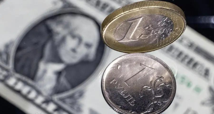 Russian rouble halts slide to pull away from over 5-week lows