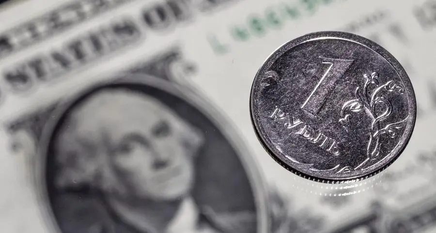 Rouble nears three-week high vs euro, stocks down